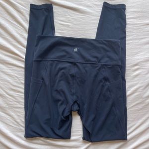 Athleta Stash Pocket Salutation Tight